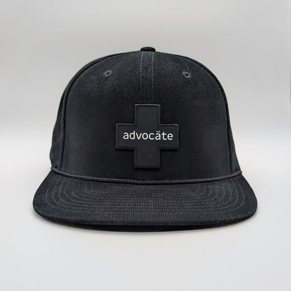 Black cap with 'advocate' logo on a white background